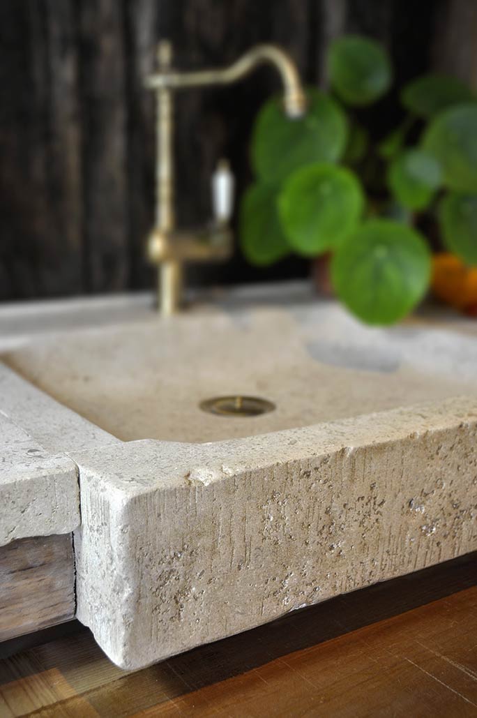 detail rough finish natural limestone kitchen sink