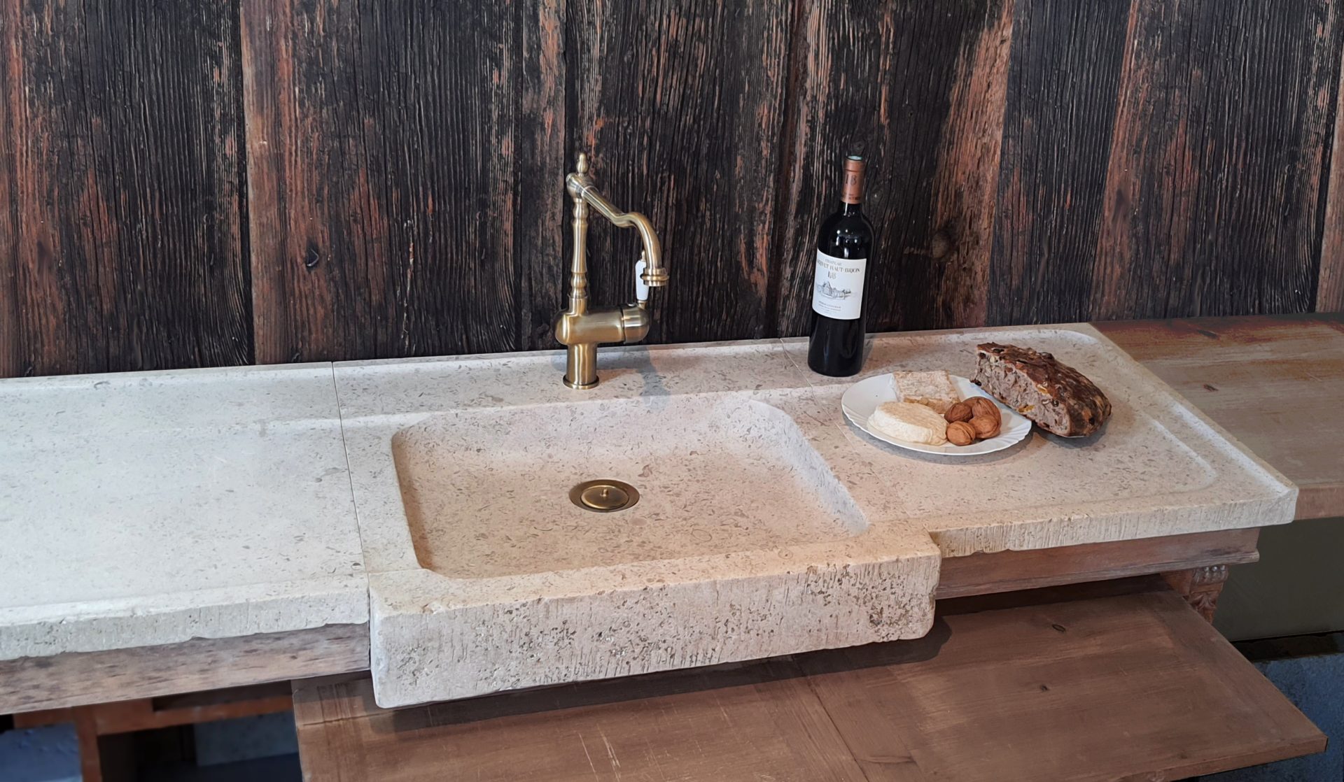 large custom-made natural limestone sink with two drainers