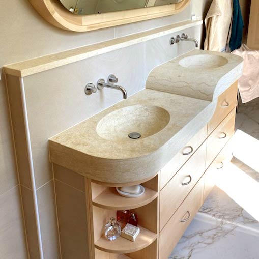double washbasin in natural limestone with oval basins