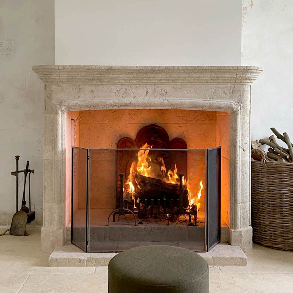custom-made ashlar fireplace with cornice and mouldings in contemporary antique style